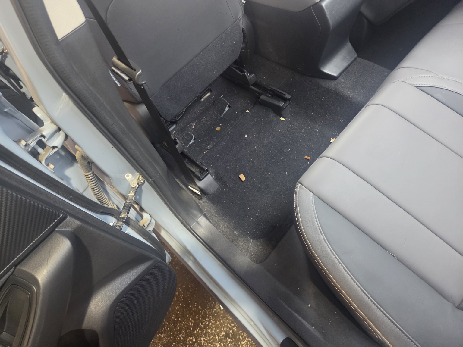 Dirty Subaru rear floor before detailing